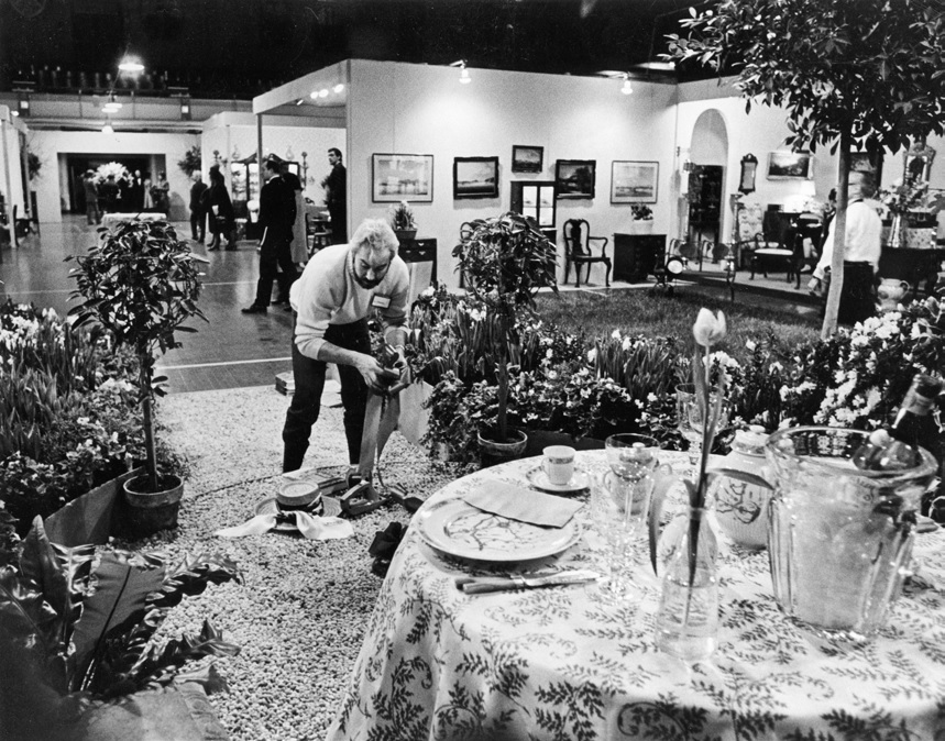 Winter Antiques Show, 1970. Finishing touches to the Conservatory Garden centrepiece.